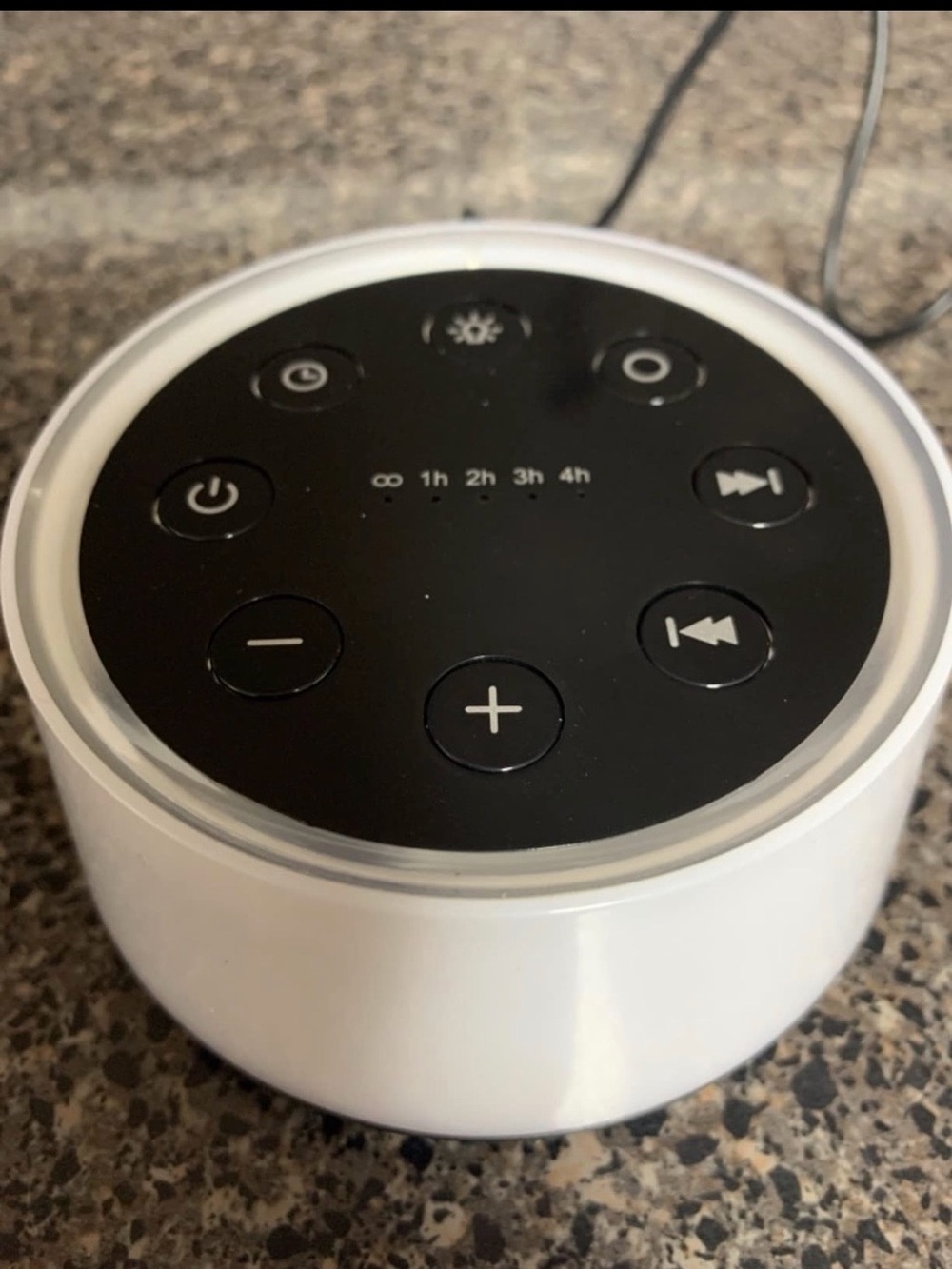 White Round Sound Machine with Black Touch Control Panel
